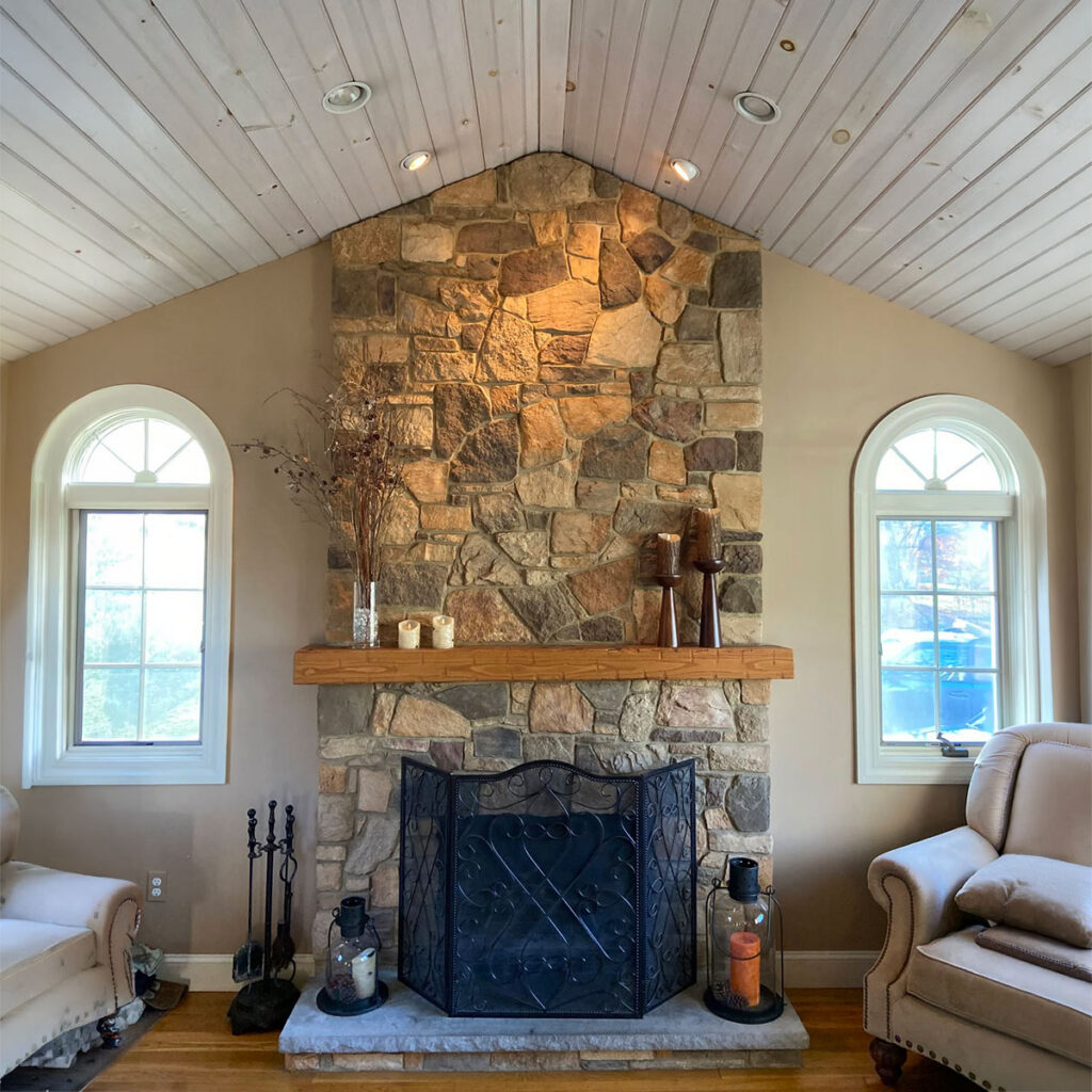 Floor-to-Ceiling Cultured Stone Fireplace in Franklin, MA