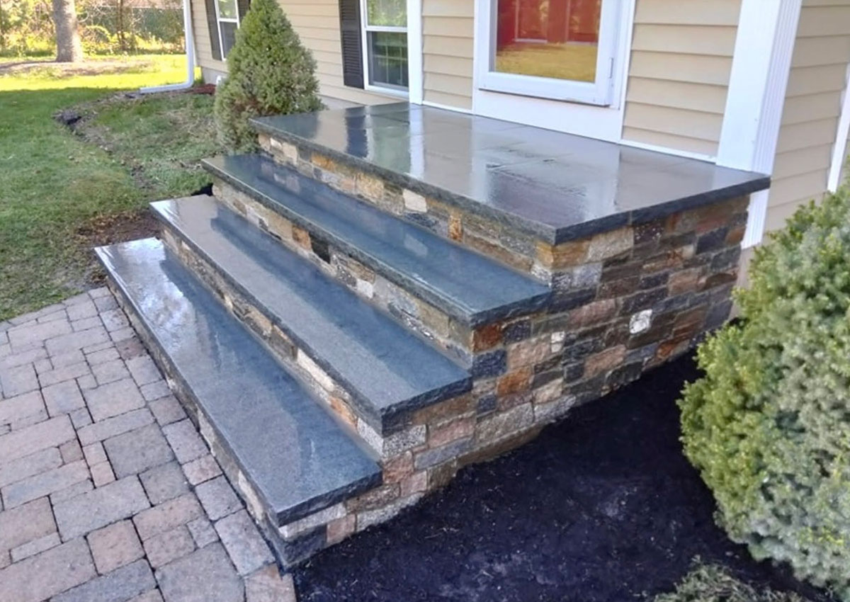Blue Mist granite entry steps with Boston Blend Ledgestone risers in Mansfield, MA