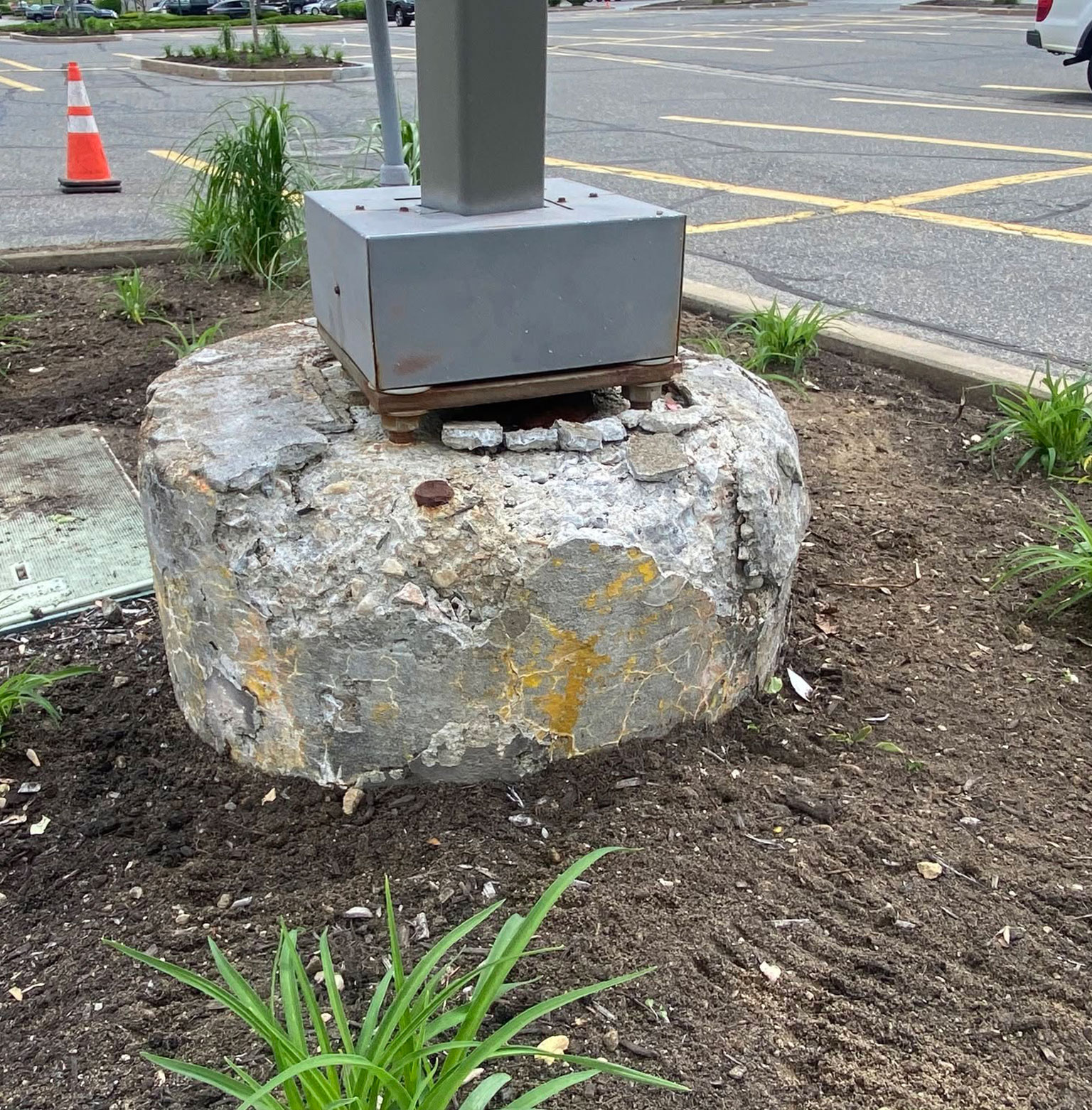 deteriorating light pole in need of repair
