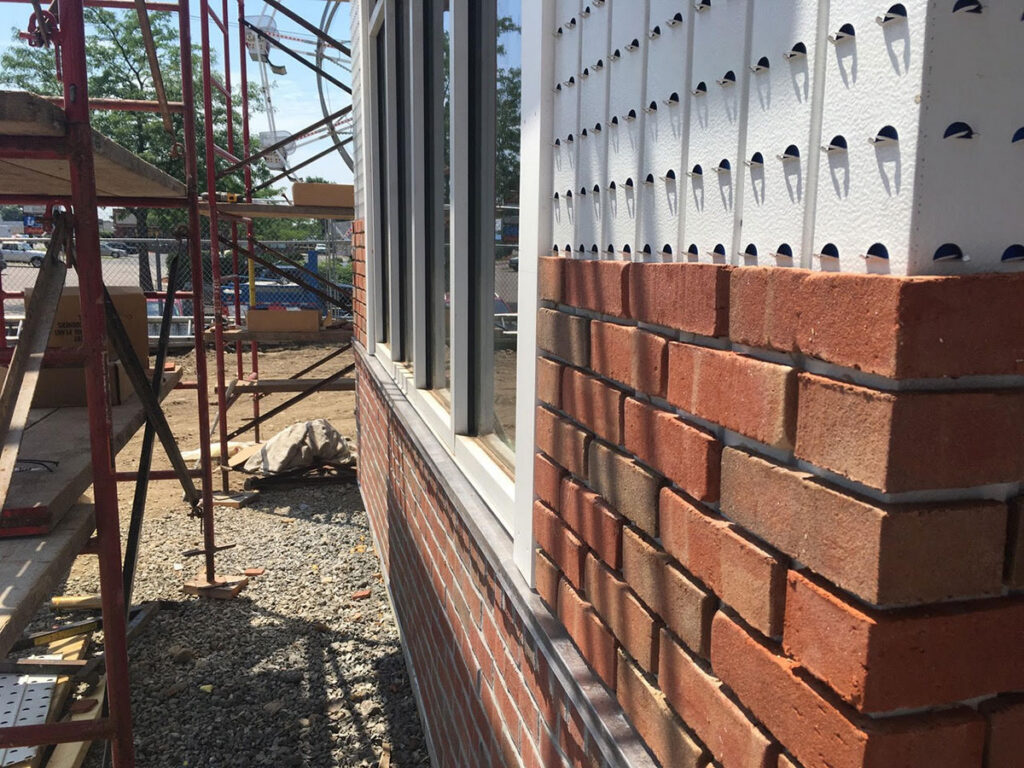 Glen-Gery Thin Tech clay brick veneer and corner units being installed in Stoughton, MA