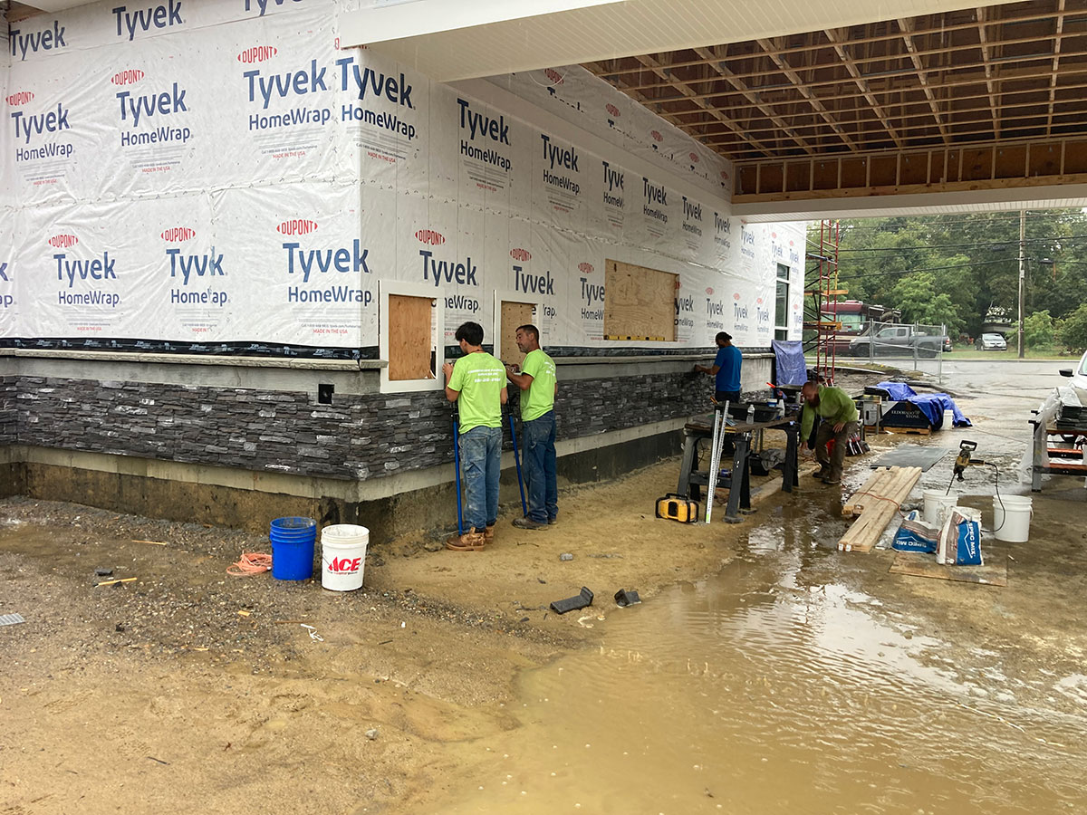 Cornerstone masons installing Eldorado Stone Dark Rundle veneer at Taunton Federal Credit Union in Wareham, MA