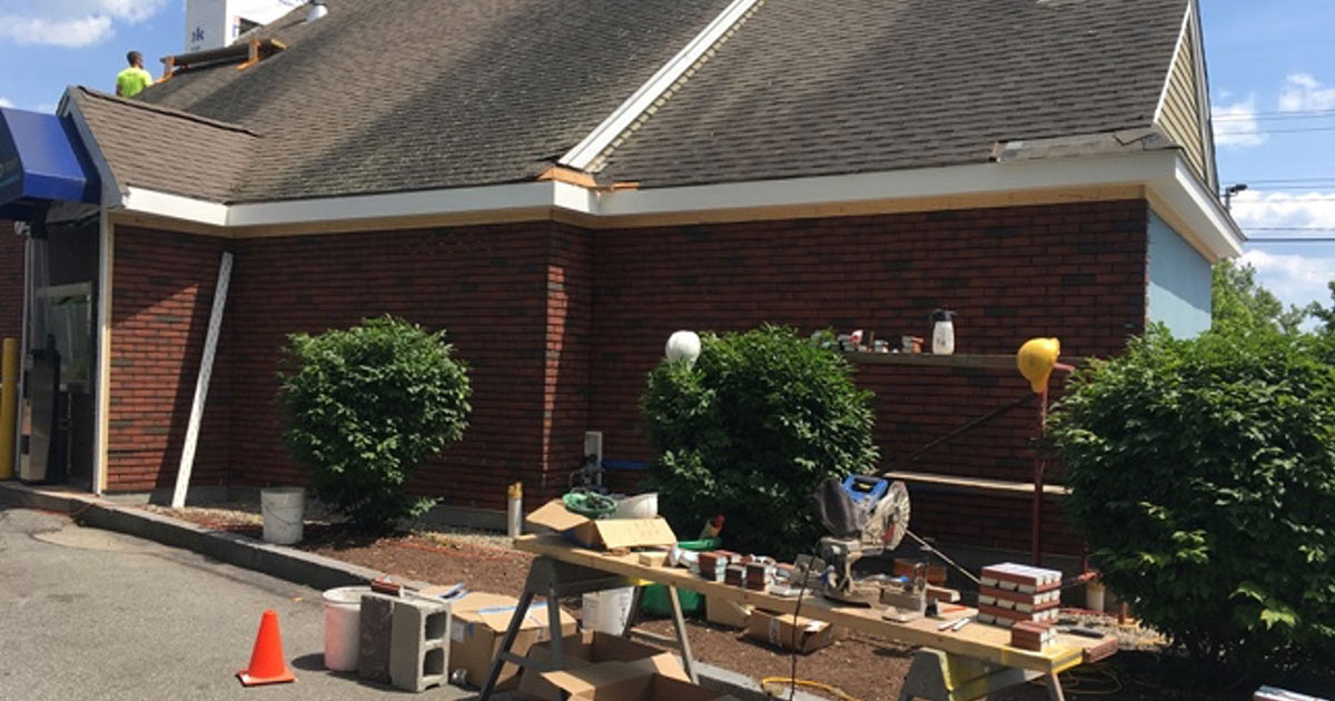 Dryvit NewBrick veneer nearing completion on the exterior of Rockland Trust Bank in Brockton.