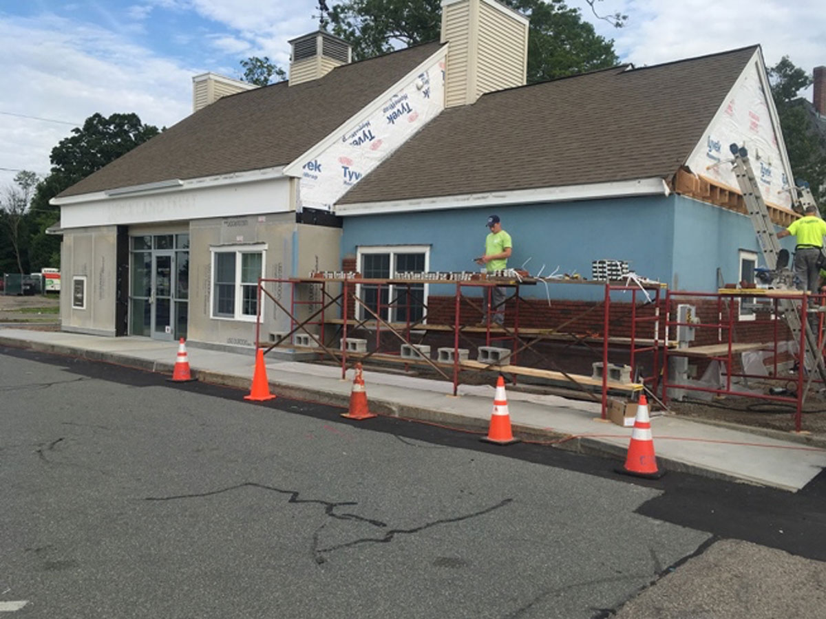 Cornerstone crew installing Dryvit NewBrick veneer on Rockland Trust Bank in Brockton, Massachusetts.