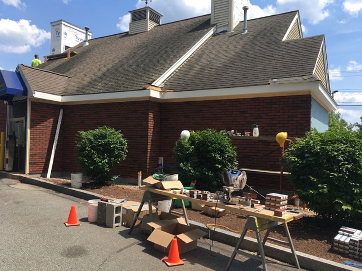 Dryvit NewBrick veneer nearing completion on the exterior of Rockland Trust Bank in Brockton.