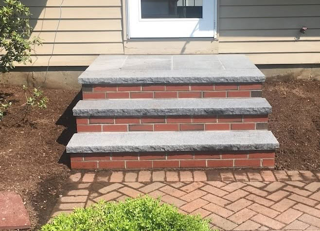 granite tread and brick riser entry steps