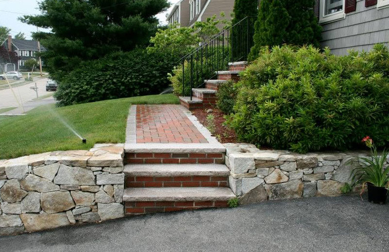 granite front steps and brick walkway
