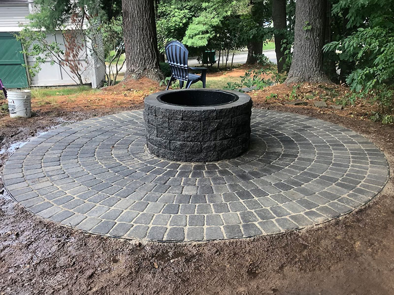 outdoor fire pit with masonry surround